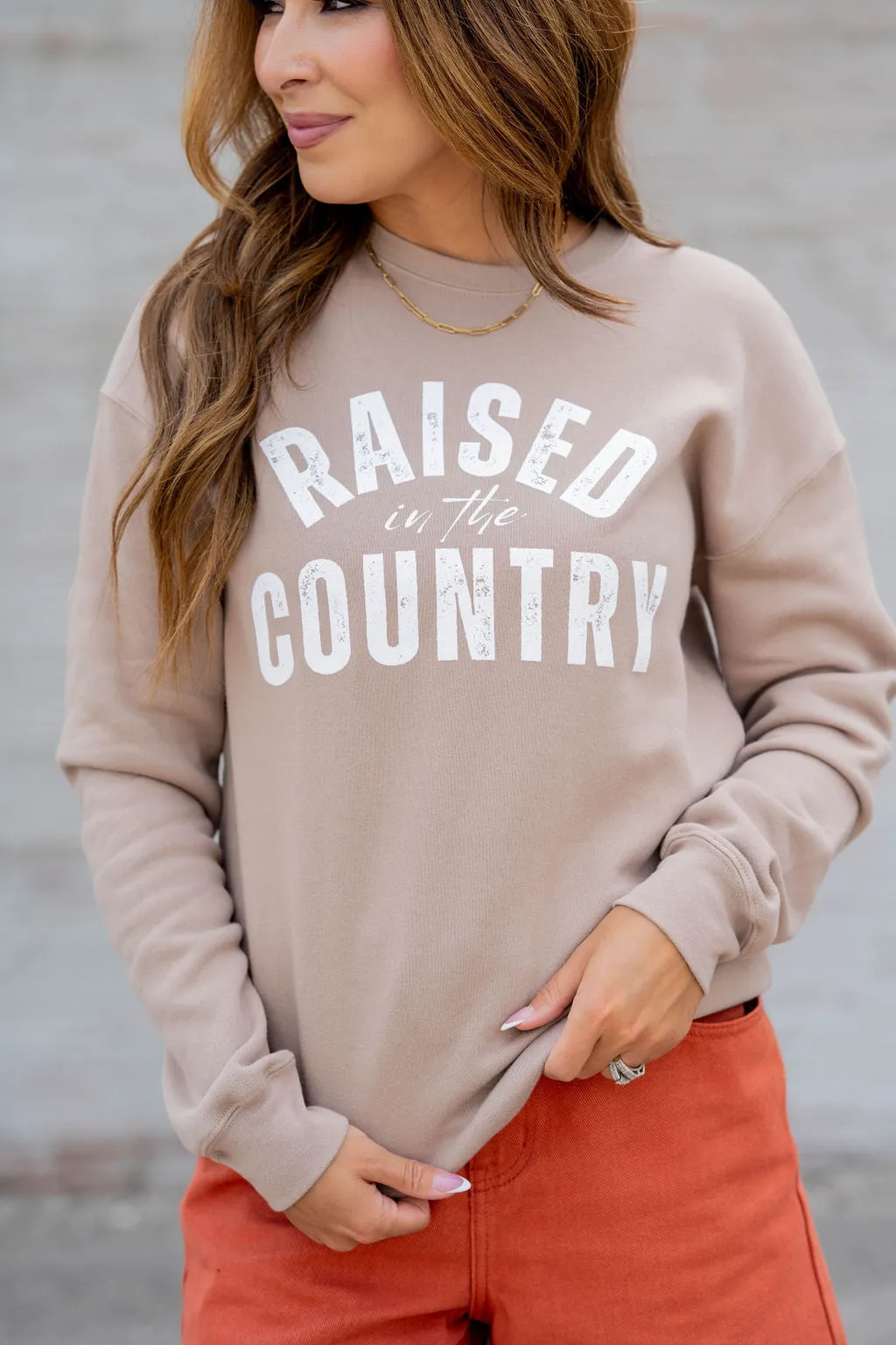 Raised In The Country Cursive Graphic Crewneck