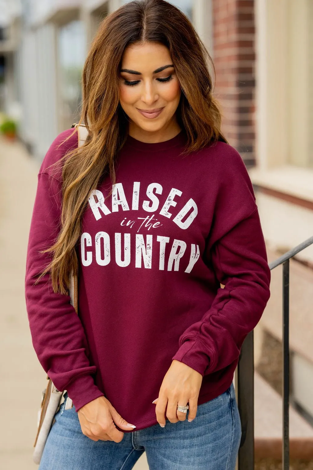 Raised In The Country Cursive Graphic Crewneck